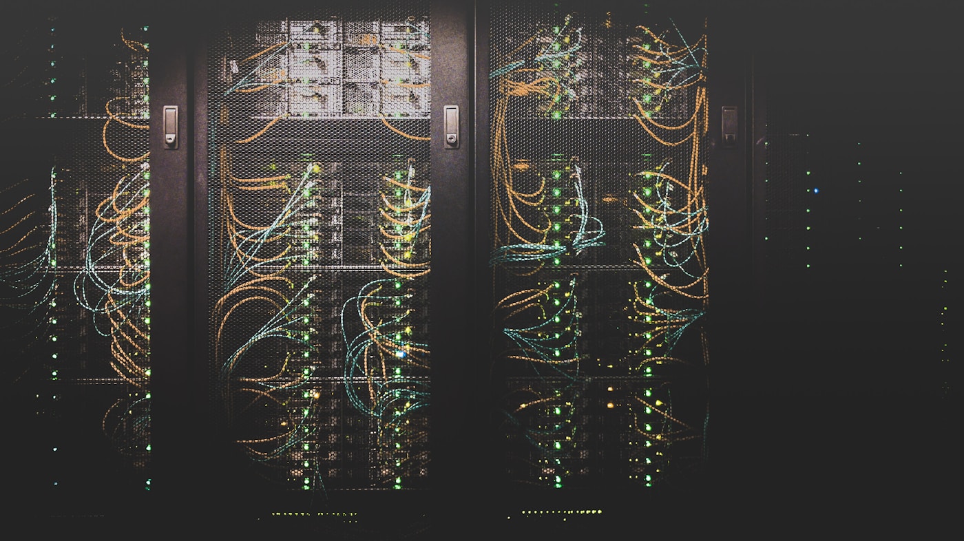 Blue-lit server racks in a data center